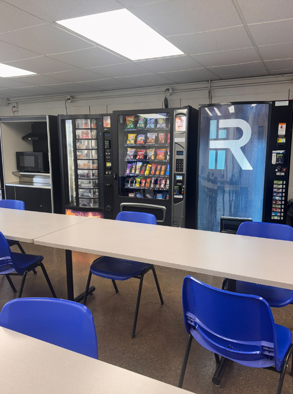 Break room with snack, beverage, and fresh food vending machines installed by Reliable Vending Services in an Eastern Kentucky workplace